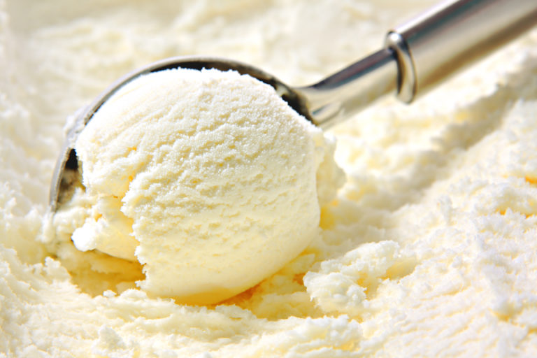 Vanilla ice cream scooped out of container Allulose